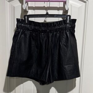 Pre owned women’s shorts/skirt black synthetic leather